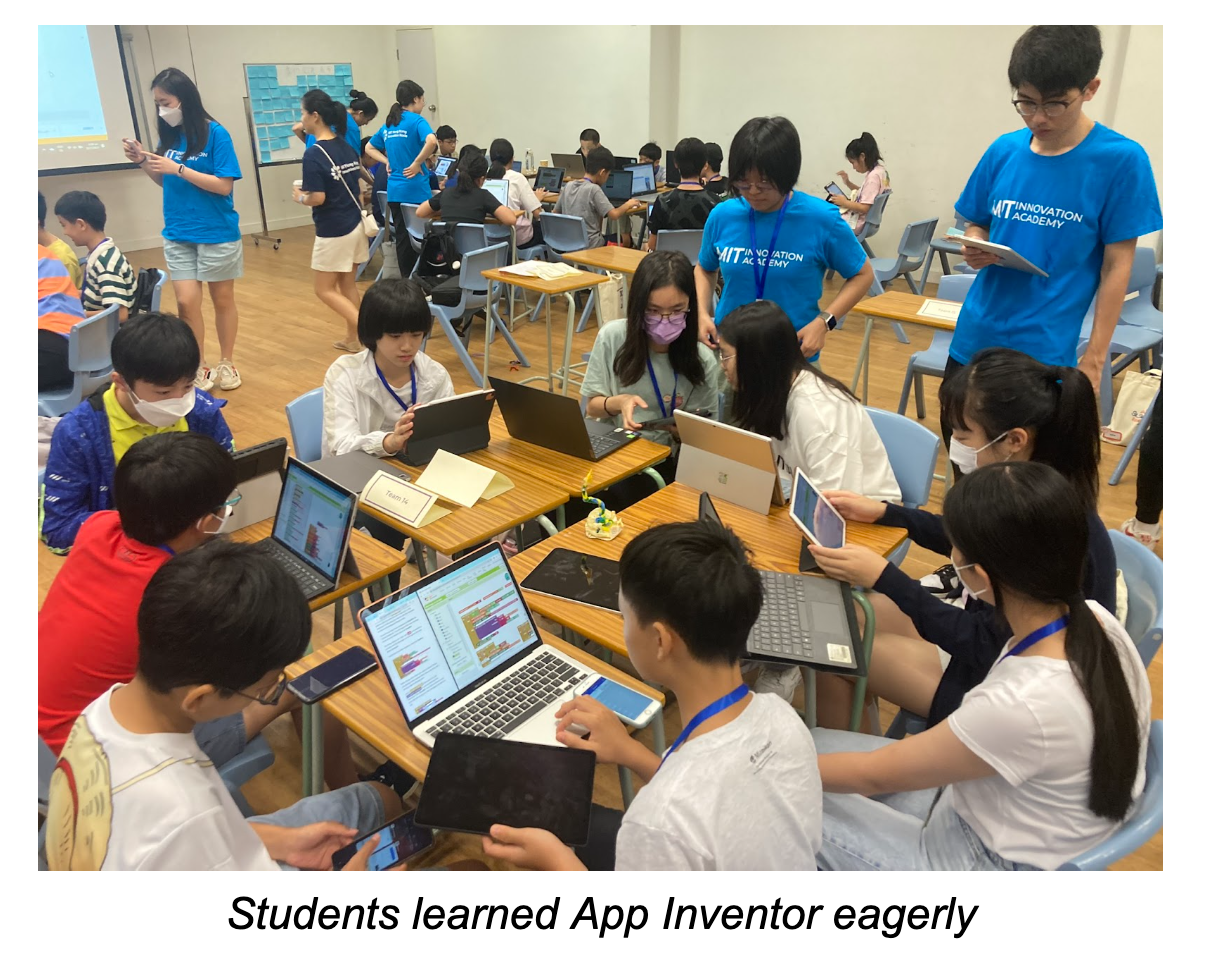 Students learning App Inventor