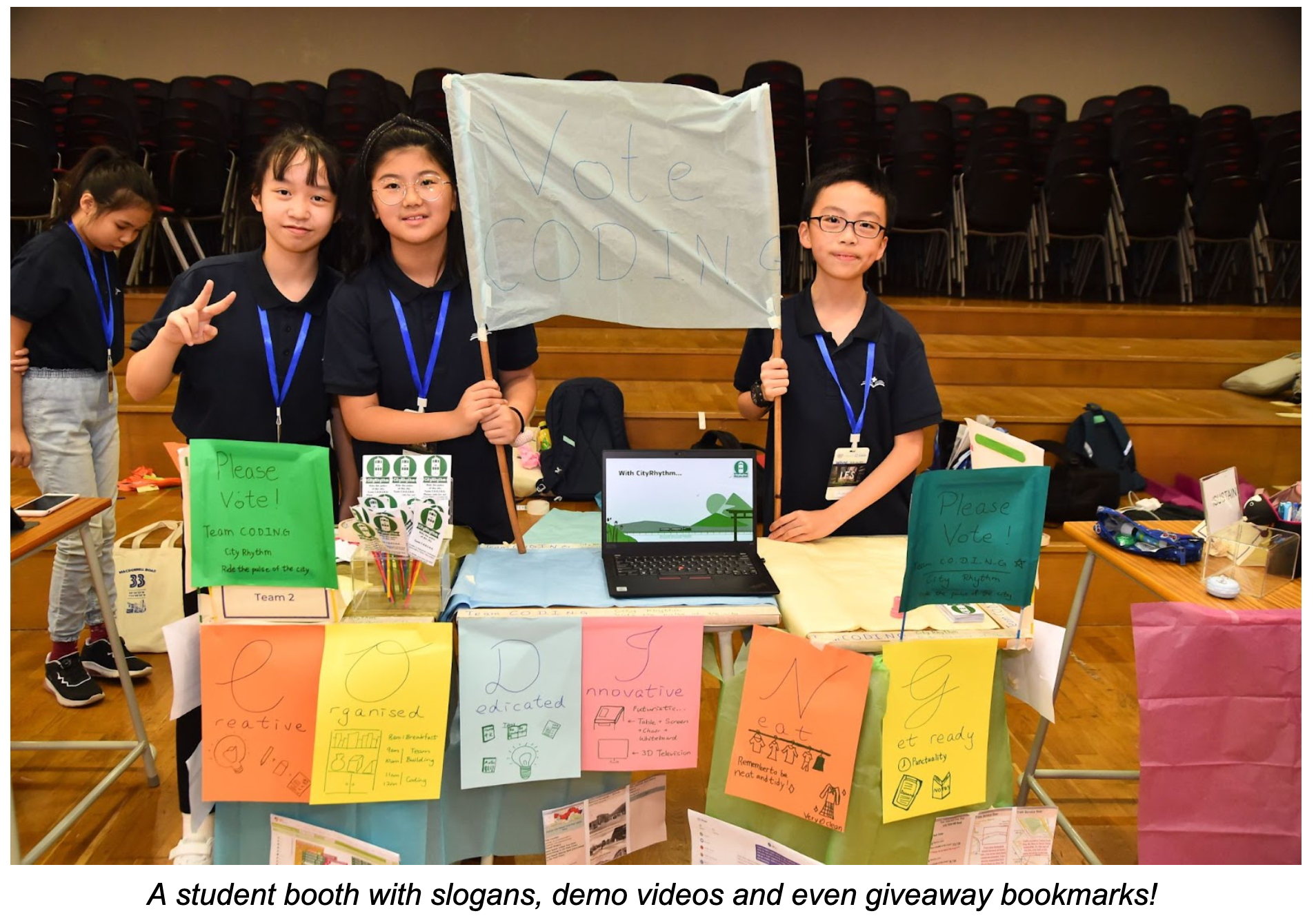 Students at their booth in camp