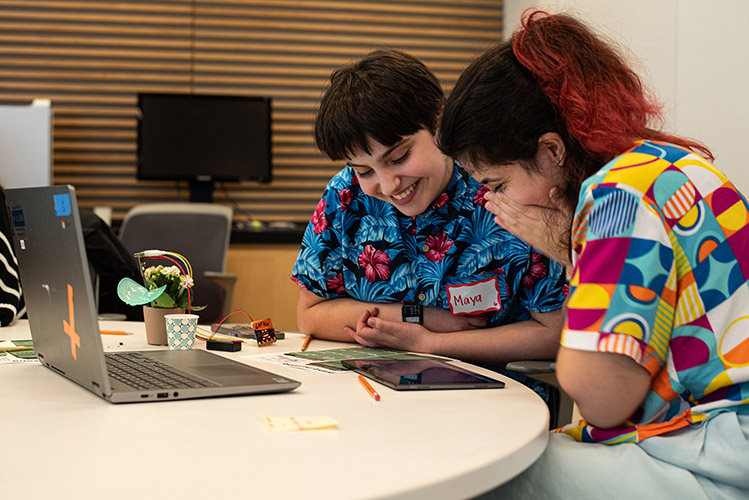 Members of a Rhode Island chapter of Girls Who Code tested <br>soil moisture sensors and AI analysis blocks with house plants.