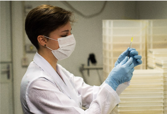 woman in lab coat